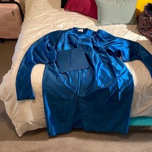 Blue Masters graduation gown with matching cap